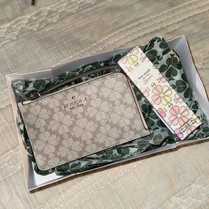 Kate Spade Lucy wristlet in dark beige and bloom perfume